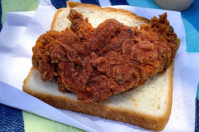 A Nashville hot chicken tender, served on white bread