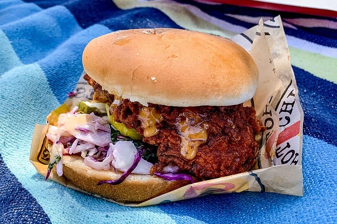 Picnicking with a hot chicken slider from Dave's Hot Chicken