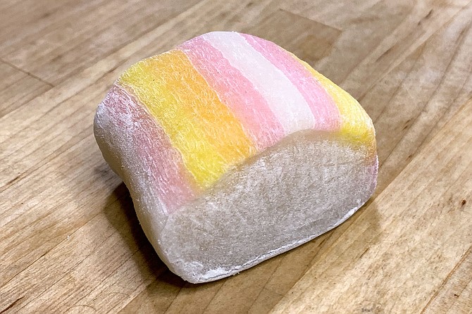 The pink and yellow striped, more chewy mochi