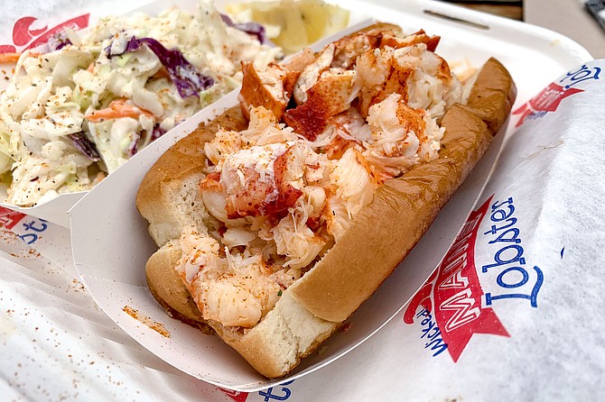 A Wicked Maine Lobster roll, served Connecticut style (warm, with butter)