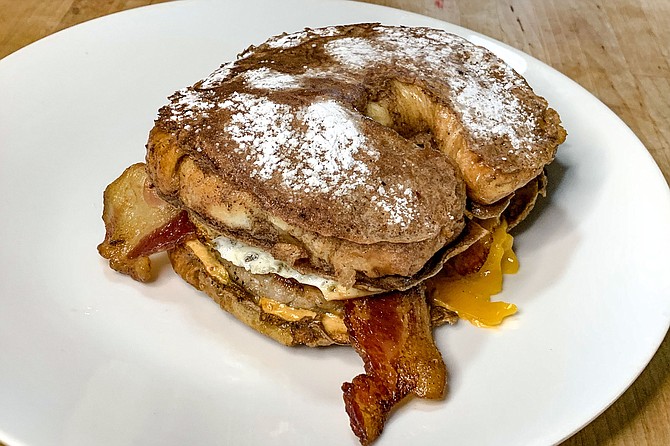 El chingon breakfast sandwich, made with a French toast croissant