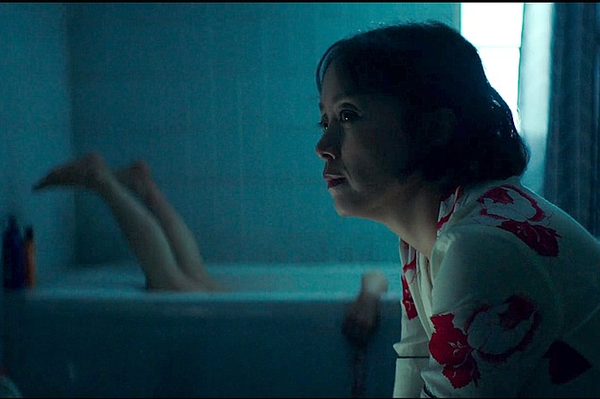 Beasts Clawing at Straws: Jeon Do-yeon stars with a pair of legs sticking from tub.