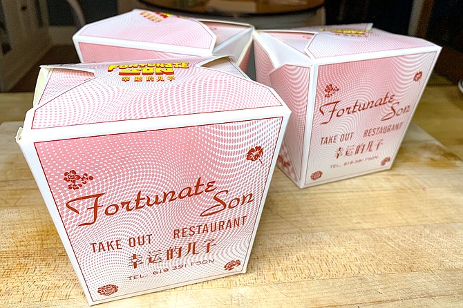 Cardboard takeout boxes are part of Fortunate Son's Chinese restaurant charms.


.