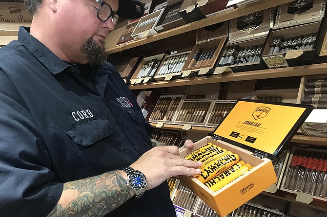 Corb of the cigar shop says Covid hasn’t slowed sales.