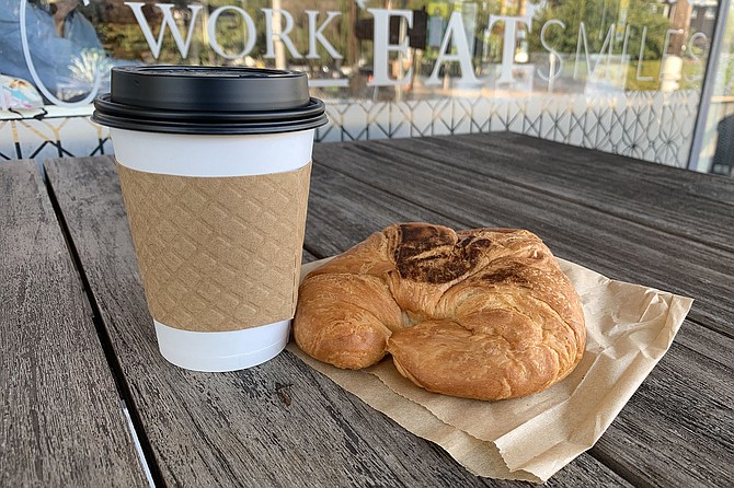 For $1.99 and a smile, Grant's Coffee Room serves coffee and a croissant.