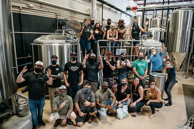San Diego brewers from several local breweries gathered at Burgeon Beer Co. to produce Capital of Craft IPA, the official brew of San Diego Beer Week. - Image by Oveth Martinez