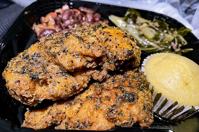 Lemon pepper chicken tenders and sides from Superior Soul Food