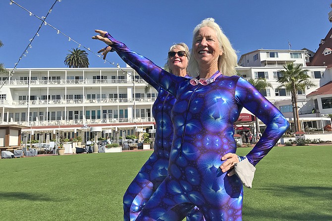 Dani Grady, 62, and Nancy Blair, 63, warm up for an hour’s performance of water ballet.