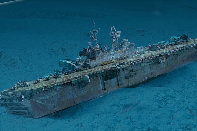 That sinking feeling: the warship will be placed directly below the famed USS Midway as a testament to the Navy’s reputation over the past 20 years or so.