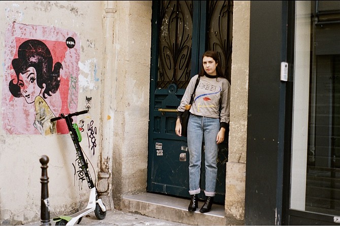 Kate McGrath outside her 200-year-old apartment in Paris.