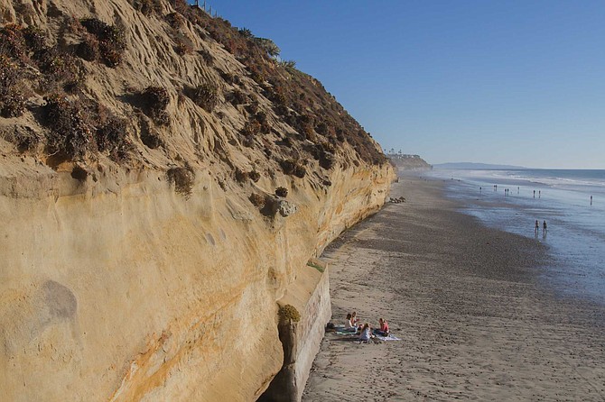 What's the funky brown sea foam washing up along the O.C. coast