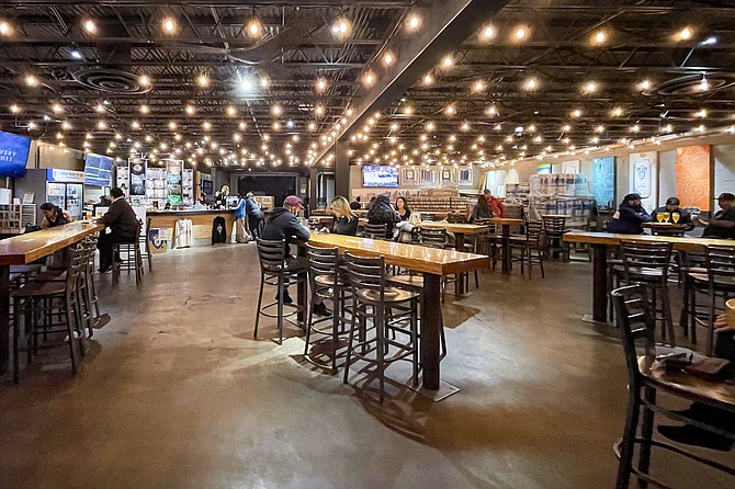 Mike Hess Brewing serves customers in North Park on January 13, while a county-wide on premise service ban remains in effect.