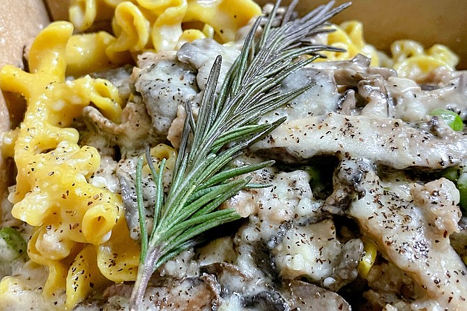 Mafalde pasta resembles ruffled ribbons, adding terrific texture to a sausage and mushroom parmesan sauce.