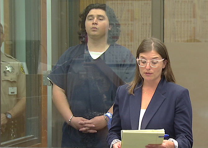 Arriola w his defense attorney Lindsay Itzhaki, at his arraignment in 2018.