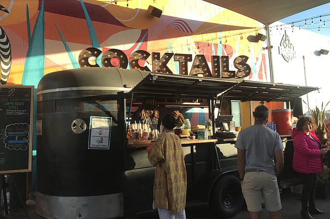 Recyclers: repurposed horse trailer is now the bar