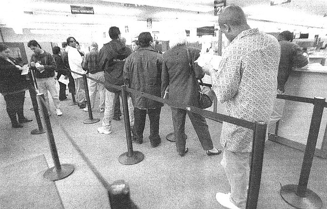 DMV, University Heights. Unemployment lines, the DMV, Social Security, disability lines, lines at the post office -- these are universal and will always resemble U.S. propaganda films of the Soviet Union. - Image by Joe Klein