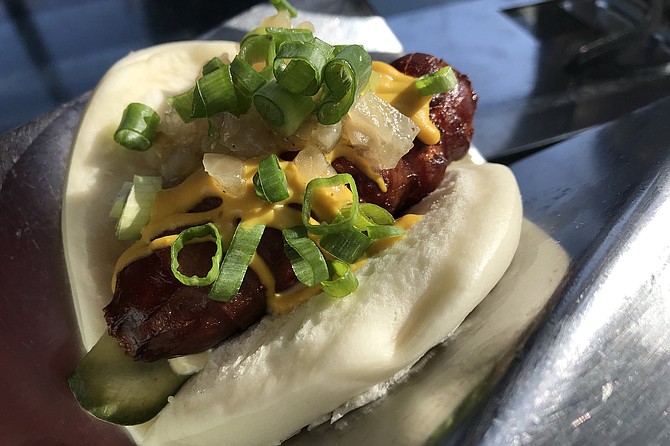 UB Street Dog. Excellent Kurubota sausage, and bacon wrapper helps. Deal at $2.50!