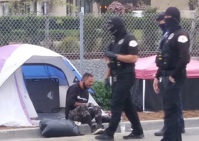 The city painted numbers in front of each tent so the belongings could eventually be returned to their owners.