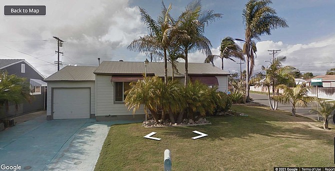 Ray and Cindy lived just one block from the 5 freeway in Oceanside, their home was near the ocean. In front of their home was a dense bunch of pygmy date palms, that tangle of plants had grown so thick it completely blocked the view of most of the front of their house. In fact the front door, and the whole front porch could hardly be seen at all.