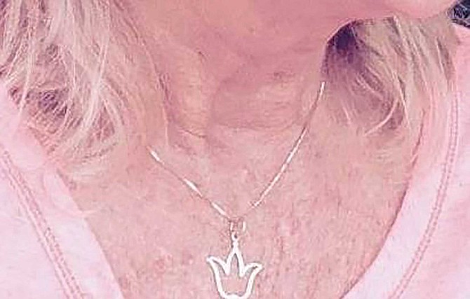 Cindy was wearing an inexpensive necklace, it was her favorite and the one she wore most often, it had a fine chain holding a slender pendant in the shape of a lotus blossom. But the violent man was not interested in that necklace.