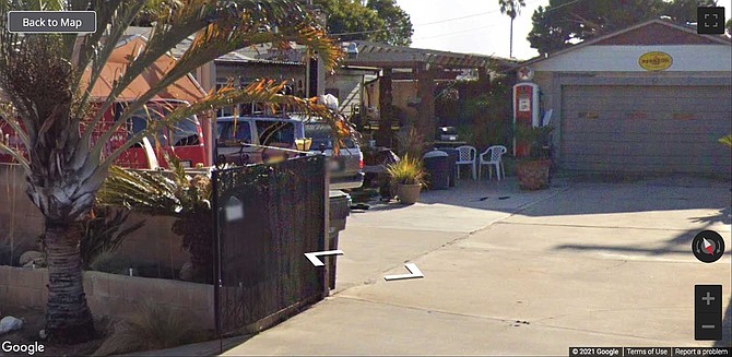 In contrast to the front of Ray and Cindy's house, the back yard area was plain to see, both gates were wide open there.