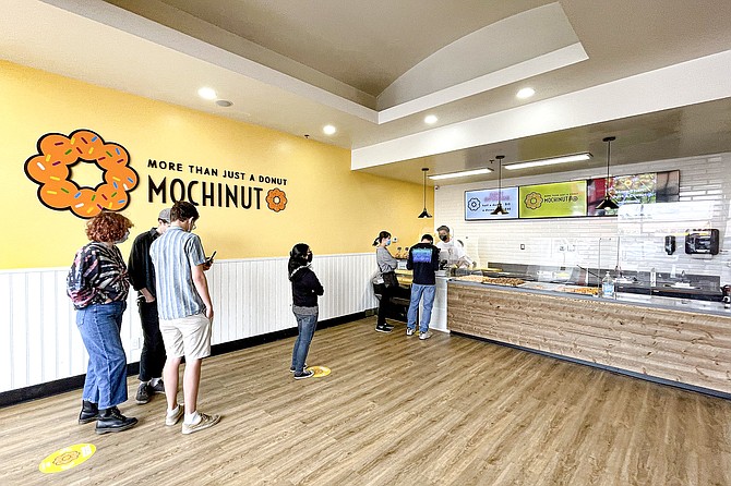 The front of a long line at Convoy's newest dessert counter, Mochinuts