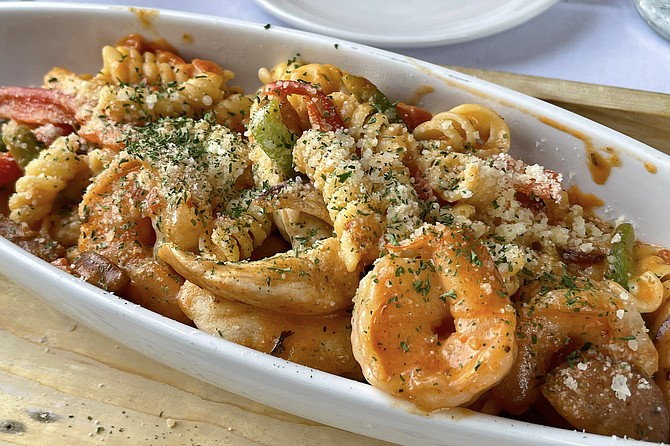 A creamy, spicy, jambalaya pasta with chicken and shrimp