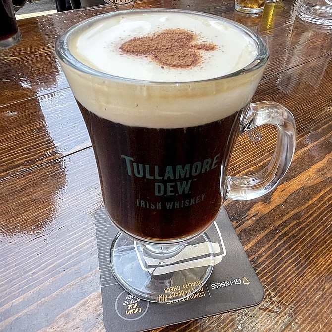 Irish coffee with a shamrock of chocolate