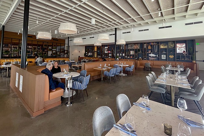 The spacious interior of Arlo, the hotel restaurant at the Town & Country resort