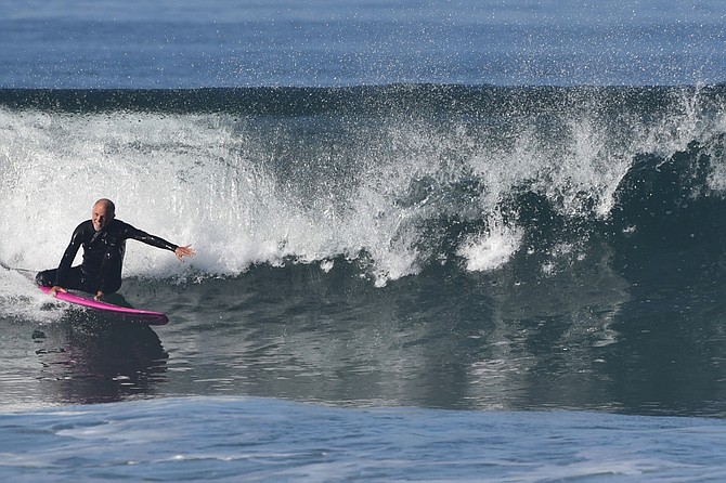 Darius Degher surfing
