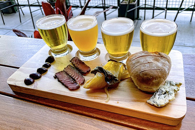 A beer pairing board matches elevated bar snacks with select beers.