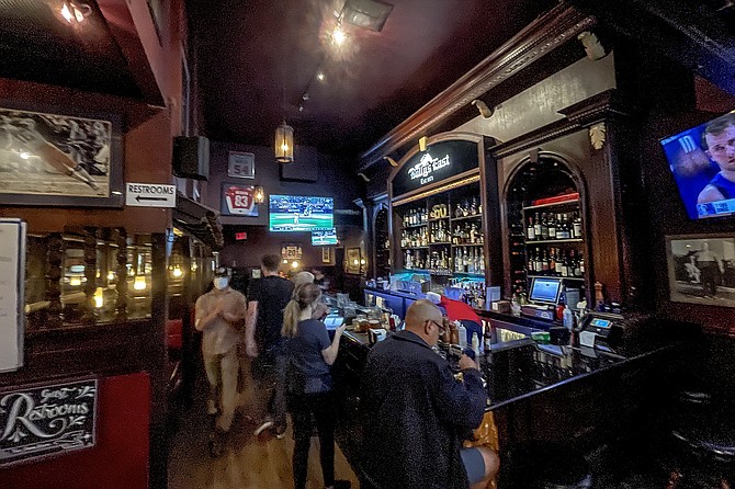 The vintage bar of Bully's East, busy on a packed Saturday night