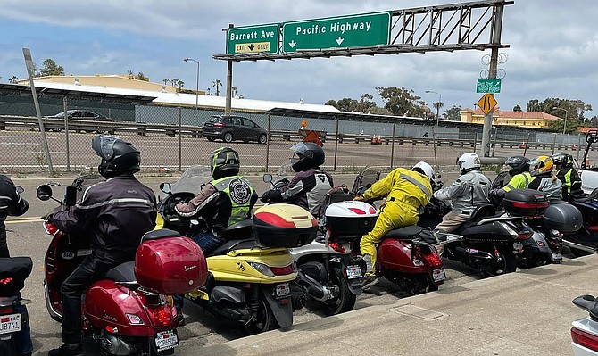Vespa riders face Pacific Highway