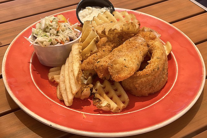 The small fish and chips platter, featuring three pieces of cod for $14 (six pieces cost $19)