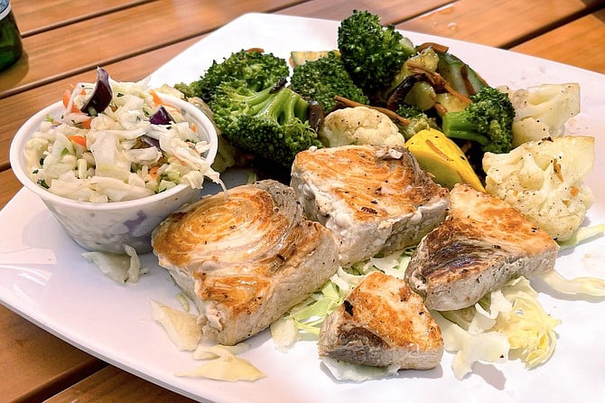 The small (5-ounce) plate of grilled swordfish and two sides costs $17, compared to a 10-ounce plate for $22