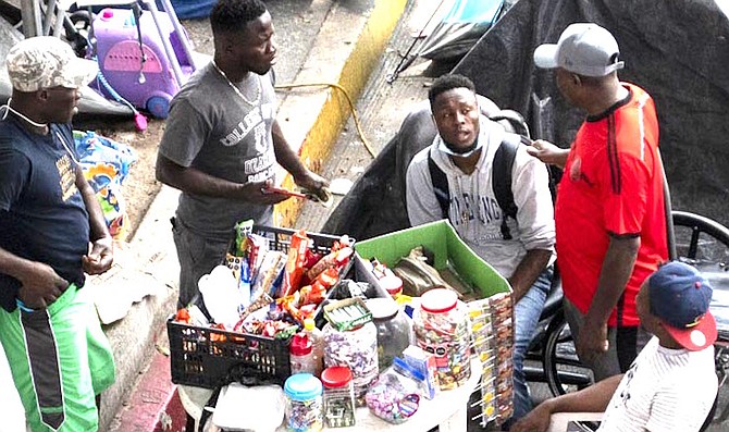 The Hondurans: “The Haitians just come to start up fights and encourage chaos in the camp."