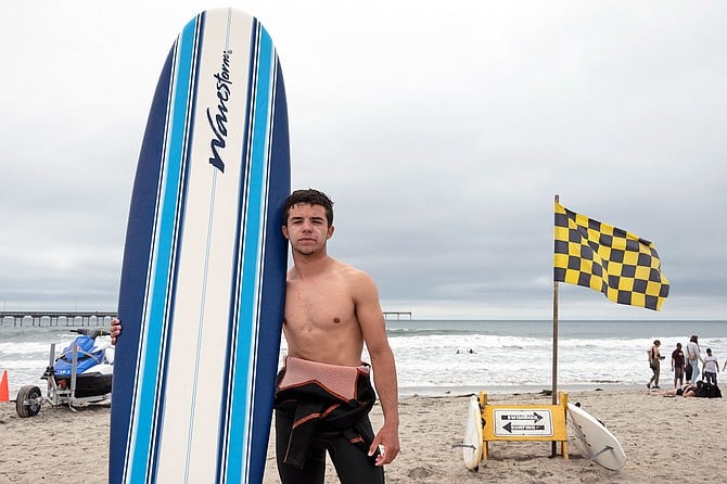 Chula Vista native Zachary O’Hara, an 18-year-old surf instructor at the San Diego Surf School.