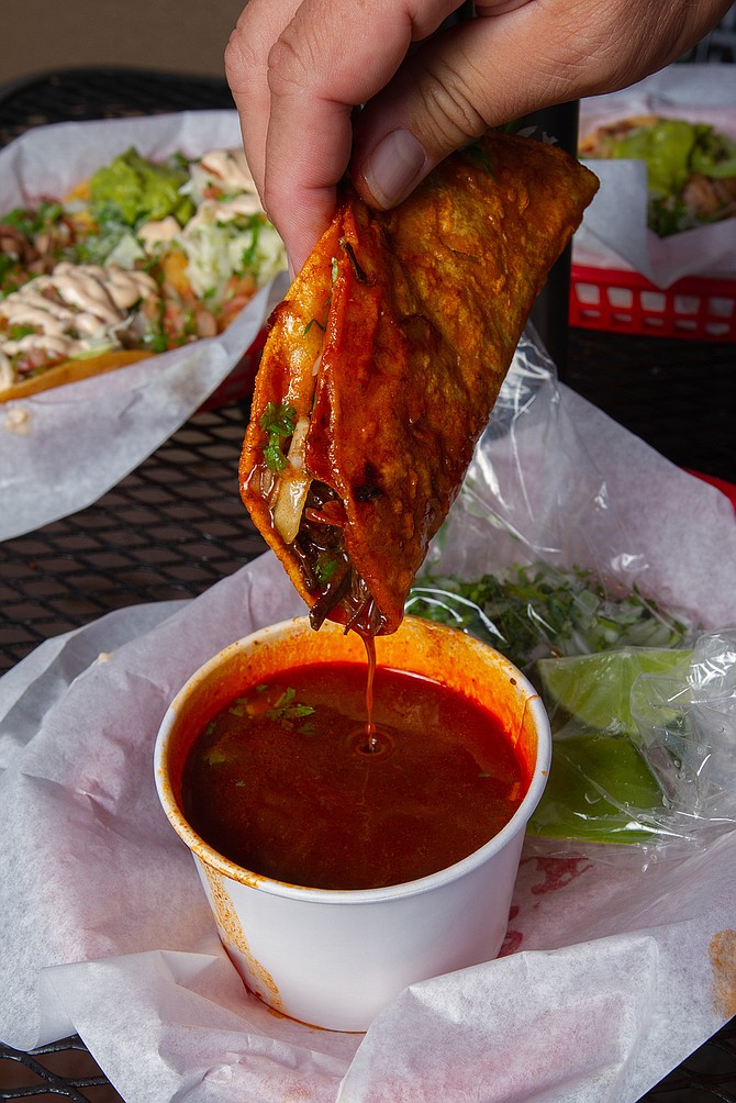 Dripping birria at Los Tacos