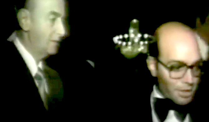 "If you try to undermine anything I want to do here," Glick (right in photo) quoted Rosenthal (left) as telling him in October 1974, "You will never leave this corporation alive."