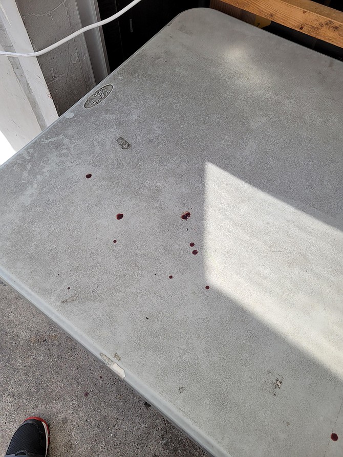 Blood left on table