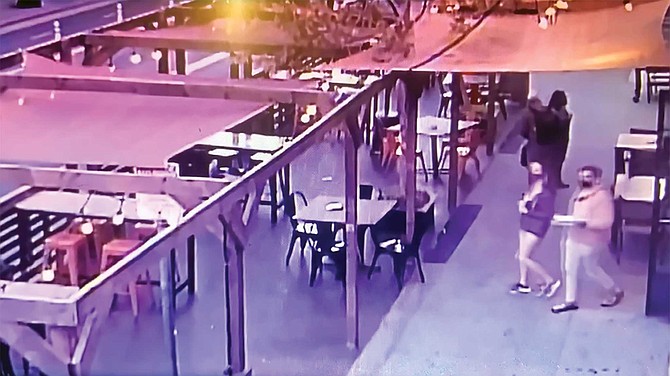 Basic’s surveillance cameras show Kahle and her date leaving the restaurant with leftovers in hand at 7:21 pm. That’s followed by a second video showing them crossing the street, with Kahle’s  date walking just slightly ahead of her.