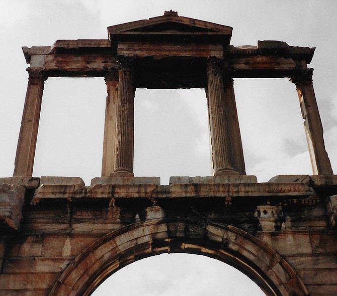 Built in 131-32 A.D., Hadrian's Arch spans an ancient road in the center of Athens, southeast of the Acropolis.