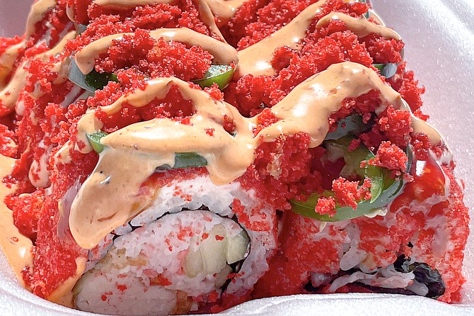 Flamin' Hot Cheeto crumbs give the Don Cheto Roll its distinctive red color.
