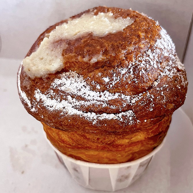 A "cruffin," or croissant-muffin, filled with vanilla custard