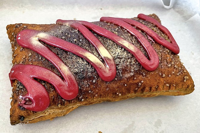 A berry "pop tart" with edible gold spray, which happens to be vegan