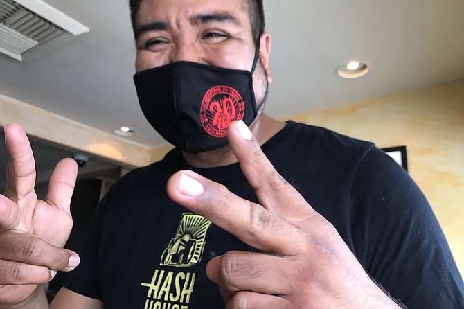 Ernesto, wearing Hash House’s 20th anniversary mask.