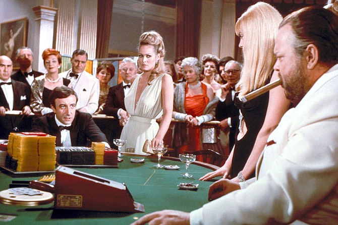 Casino Royale: Ursula Andress runs interference between a feuding Peter Sellers and Orson Welles.
