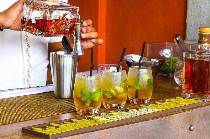 Bartender mixing cocktails