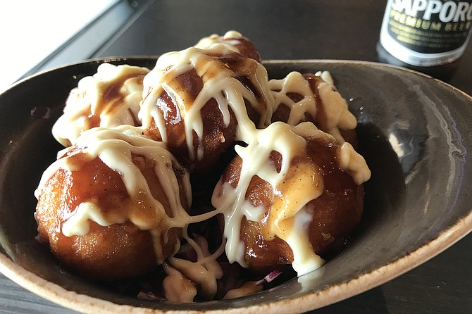 Takoyaki, “Octopus balls,” sweet and filling.