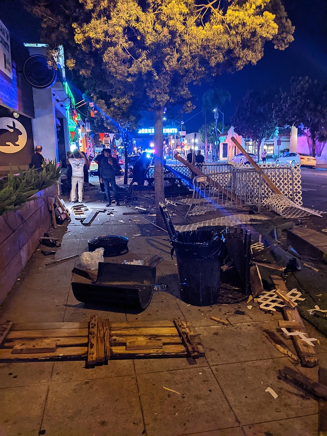 The subcompact vehicle continued onto the sidewalk and swiped the storefronts of Nozaru, a ramen-and-sushi bar, and The Ould Sod.